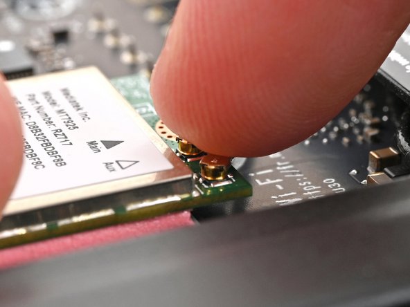 Tweezers can help position the connector.