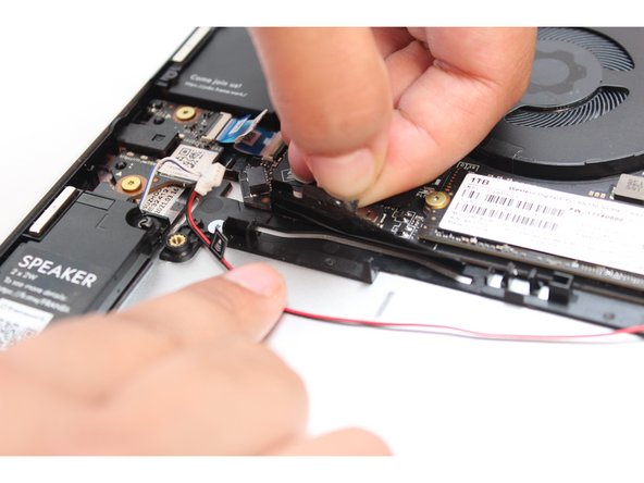 Do not completely remove the tape from the Bottom Cover, peel it back just enough to reveal the wires.