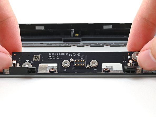 Use your fingers to lift the board straight off the Expansion Bay Shell and remove it.