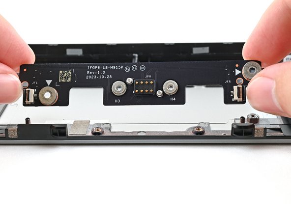 Use your fingers to lift the board straight off the Expansion Bay Shell and remove it.