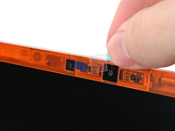 If there are any plastic liners covering the webcam and microphone, remove them.