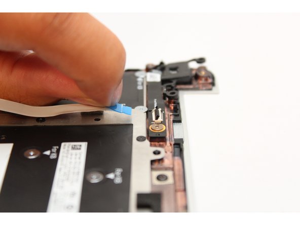 Disconnect the Fingerprint Cable from the Fingerprint Reader.  Flip the black latch up using your fingernail or spudger end of the Framework Screwdriver and pull the cable straight out.