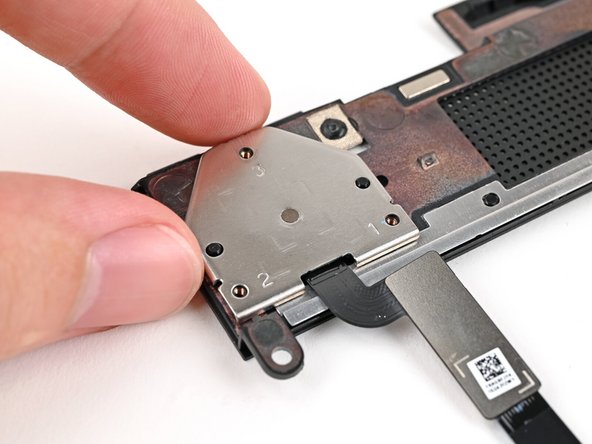 Place the fingerprint reader cover over the back of the reader.