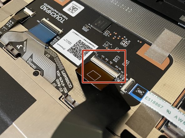 Before closing up the laptop, make sure that the Touchpad end of the Touchpad Cable is fully seated in the receptacle.
