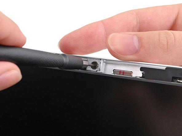 The washers underneath the screws are magnetic. If they come off with the screws, you can skip the next step.