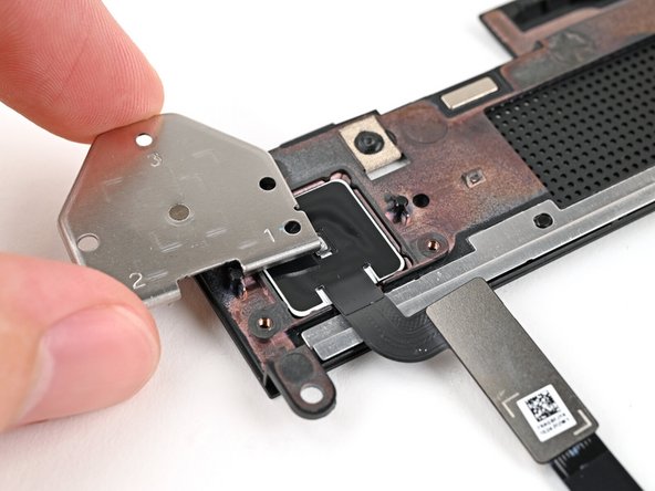 Place the fingerprint reader cover over the back of the reader.