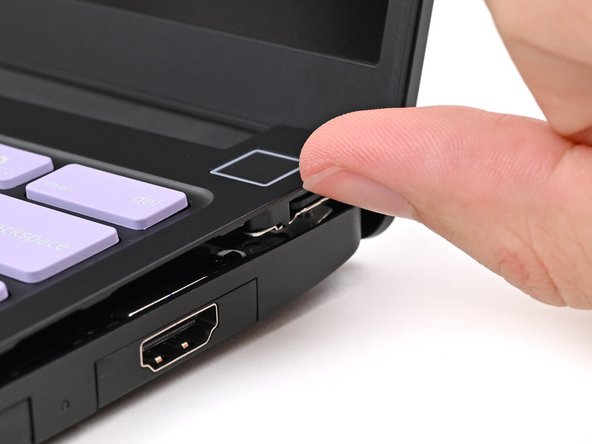 Use your fingers to lift the Input Cover up and release it from its magnets.