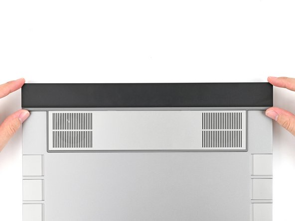 Close your laptop and flip it over.