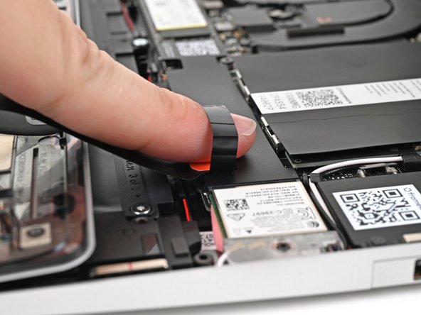 Align the press connector over its socket and press down with your finger.