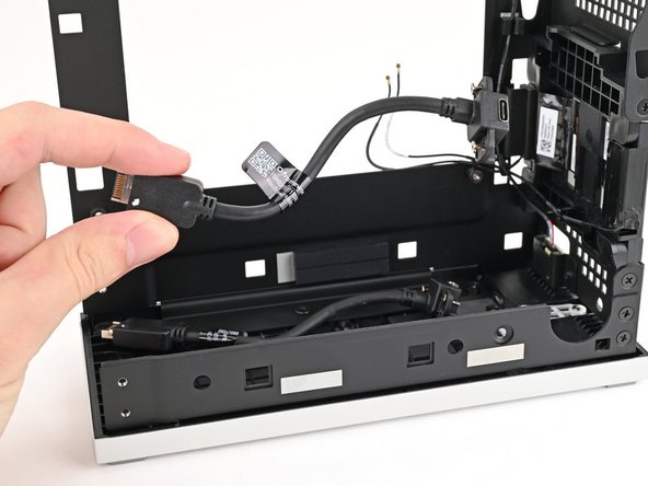 Lift the Expansion Card cables out of the Desktop and remove them.