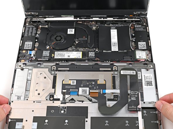 This allows the Touchpad Cable to be folded over and reconnected without straining it.
