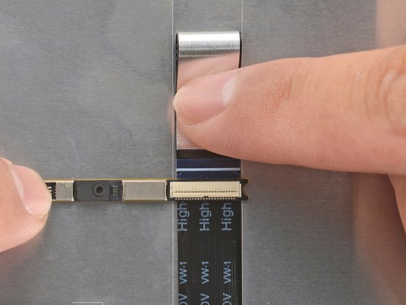 Bend an inch (2.5 cm) of the webcam cable over so that the shiny side is facing you.