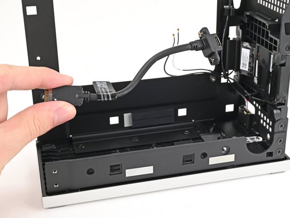 Lift the Expansion Card cables out of the Desktop and remove them.