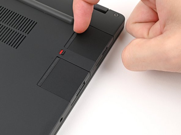 Grip the lip of the Expansion Card with your fingers.