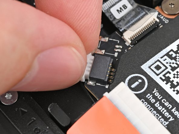 Slide the speaker connector straight into its socket.