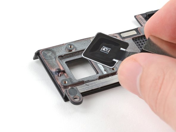 Place the fingerprint reader into its slot in the ventilation plate.