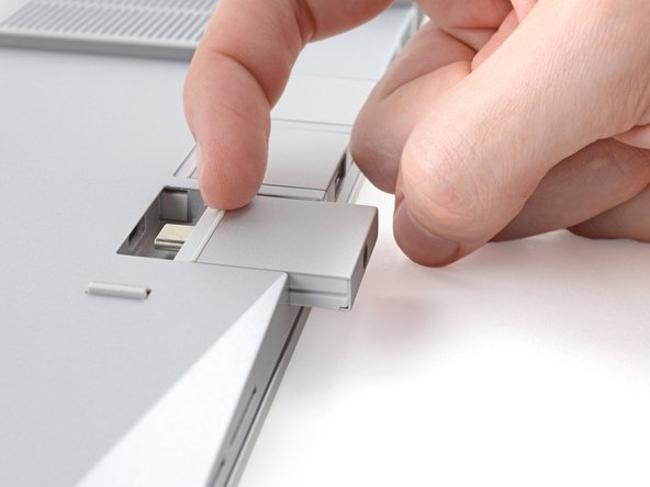 Pull the Expansion Card out of its slot and remove it.