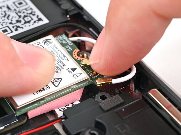 Hold the Wi-Fi Module down with your finger.