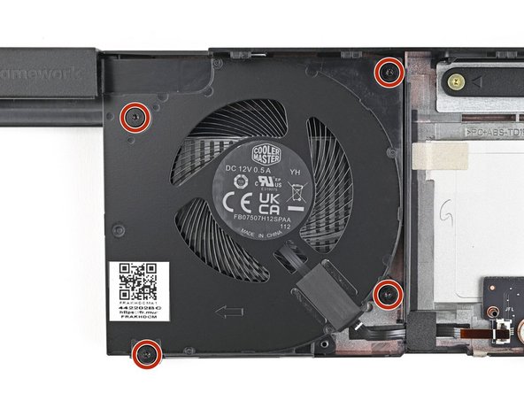 Use your Framework Screwdriver to loosen the four captive Torx T5 screws securing the left fan.