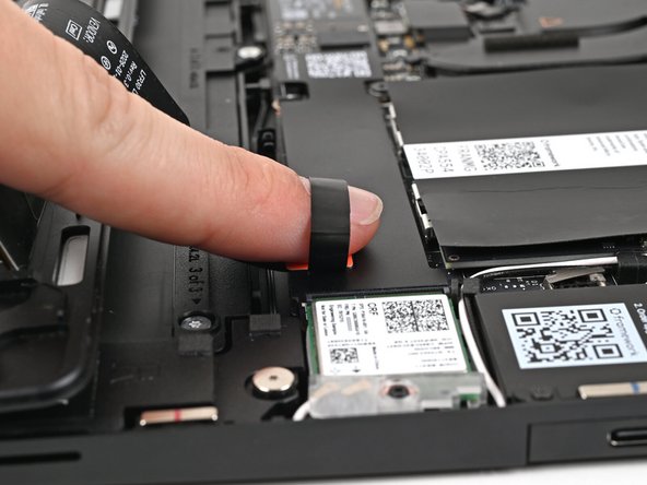 Lift up to disconnect the Touchpad Cable from the Mainboard.