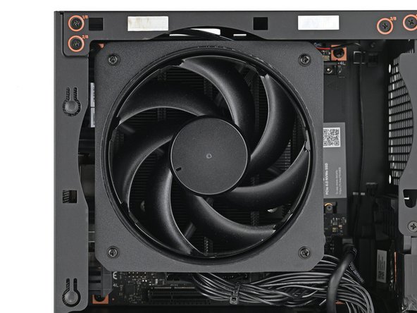 Use your Framework Desktop Screwdriver to install the four 27.3 mm‑long Phillips screws securing the CPU fan and fan duct.