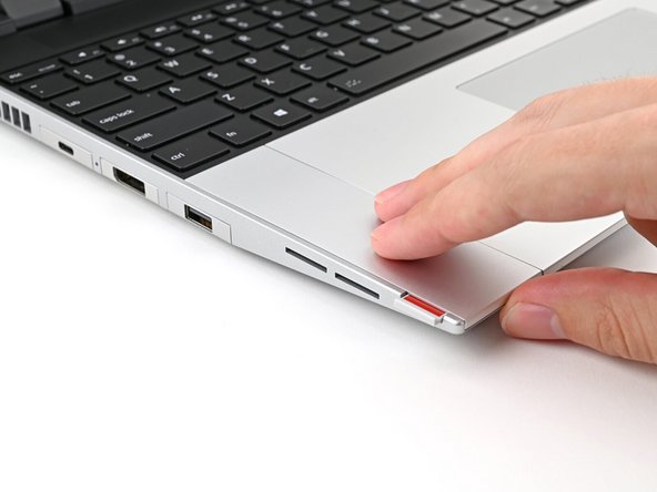 Repeat the previous step for the other Touchpad Spacer.