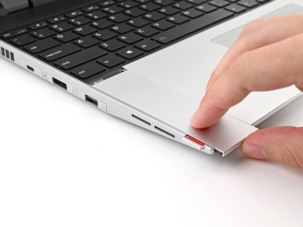 Repeat the previous step for the other Touchpad Spacer.