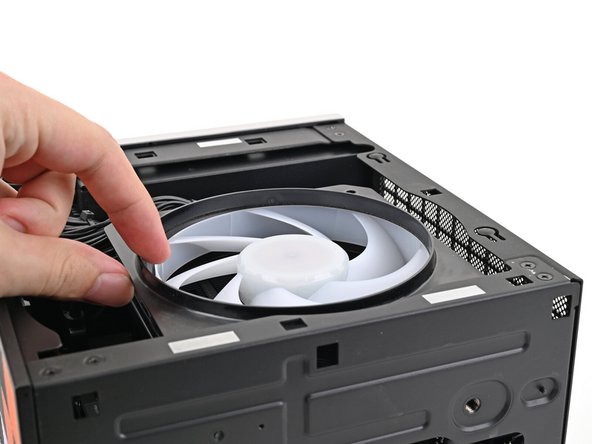 Lift the fan duct off the fan and remove it.