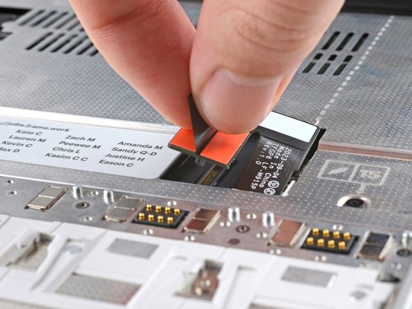 Align the Mid Plate cable press connector over its socket and press down to connect it.