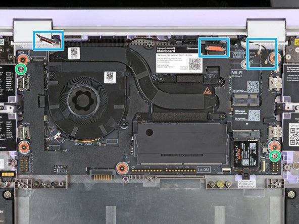 Use the two alignment pins to help align the Mainboard to the laptop.
