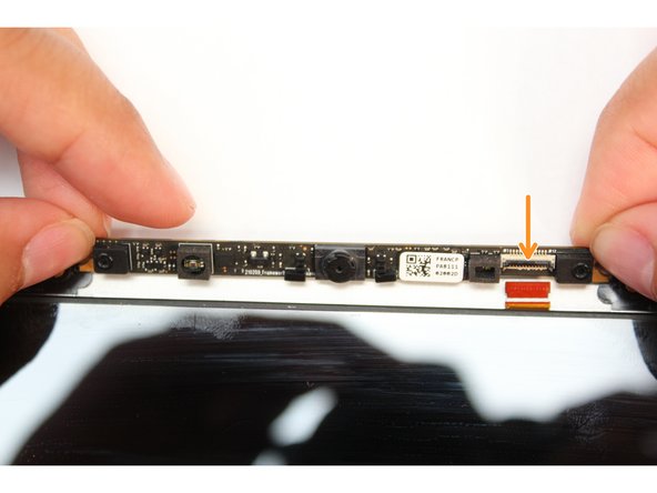 If your new Top Cover already has a Webcam Module, you can skip this step.