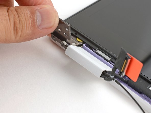 Use your fingers to twist both hinge plates so that they lay flat on your work surface.