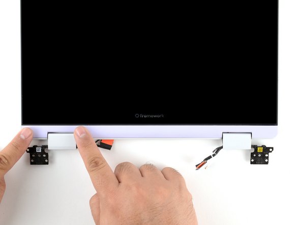 Lay the Display Cover in place below the display.