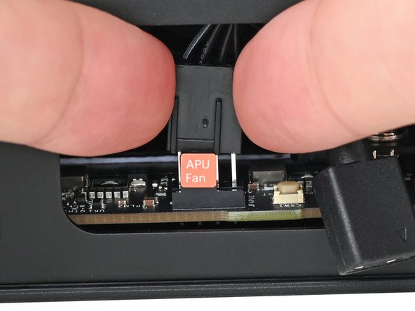 Orient the main fan cable so its two vertical lines are facing you.