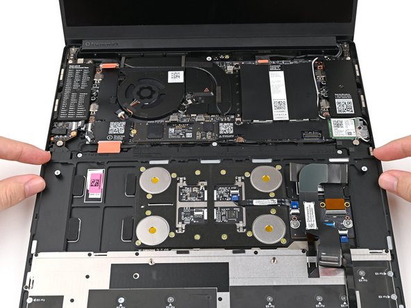 This allows the Touchpad Cable to be folded over and reconnected without straining it.