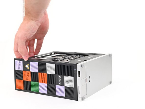 Rotate the Desktop onto its left side so the underside of the Mainboard is facing upward.