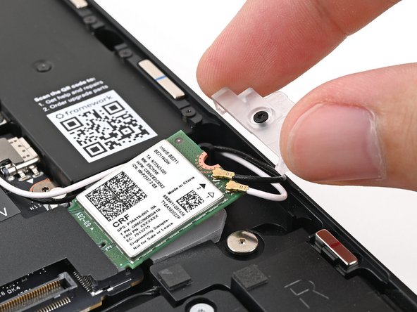 Slide the clear plastic cover straight off the module and remove it.