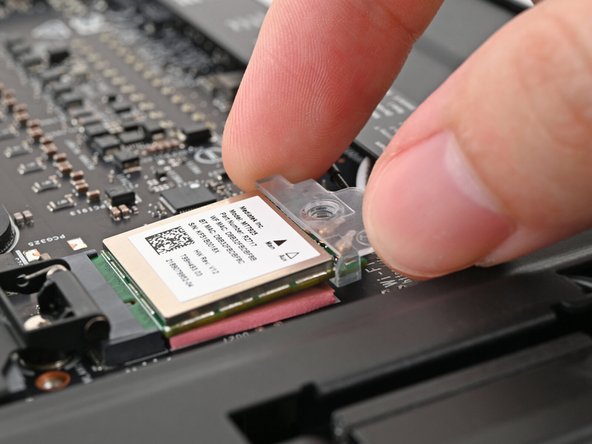 Use your fingers to slide the Wi-Fi module cover straight off the bottom of the module.