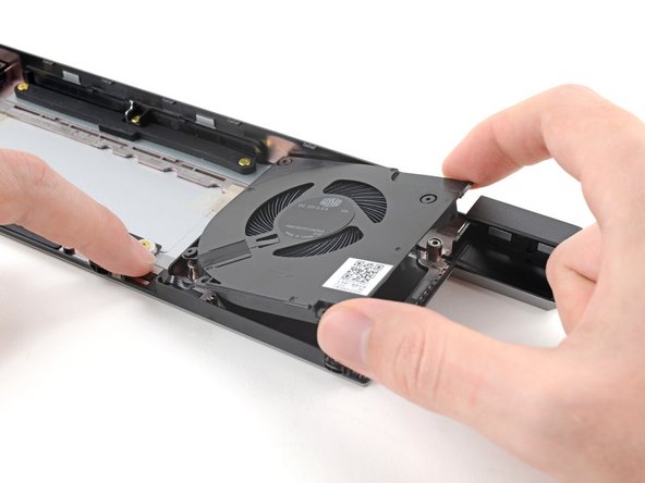 Use one hand to press the right fan cable flat to the module.