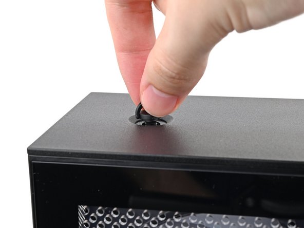 Repeat the same procedure for the other Top Panel screw.