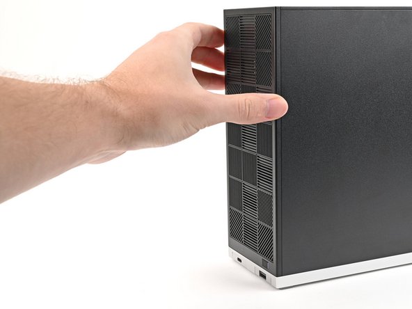 Use your fingers to pull the Front Panel off the magnets securing it to the chassis.