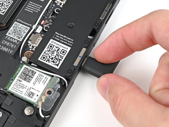 Plug the laptop into a power source.