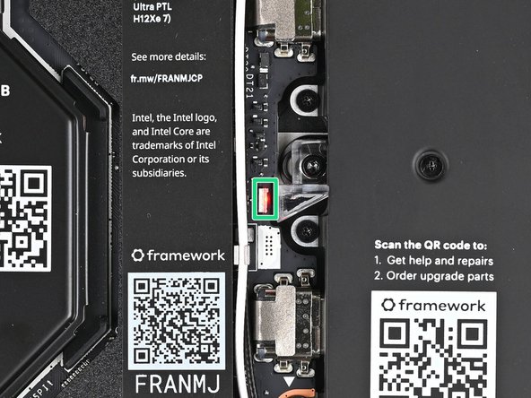 The red status LED near the right Expansion Card slots should blink continuously. If this LED isn't blinking, the laptop isn't receiving power correctly—try another USB-C port.