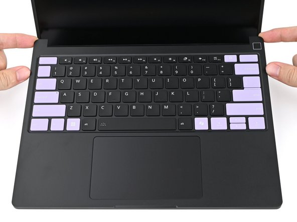 Lay the Input Cover over the laptop and let the magnets snap it into place.