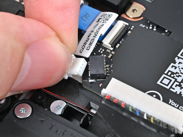 Pull the connector straight out of its socket to disconnect it.