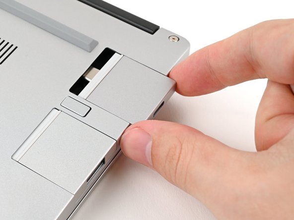 Slide the Expansion Card out of its slot and remove it.