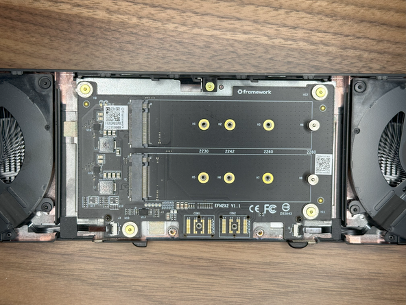 The 5 screws that were removed at the beginning should be reinserted holding the device in place.