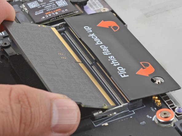 Hold the memory module by its edges. Don't touch the gold contacts with your fingers. If you do, wipe the contacts with a clean, lint-free cloth to remove any finger oils.