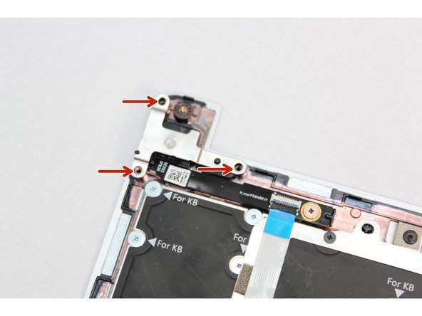 Using the T5 bit in the Frameworks Screwdriver screw the three fasteners into place.