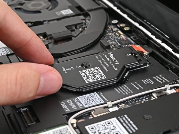 Lift the LPCAMM2 Memory Cover straight off the memory and remove it.